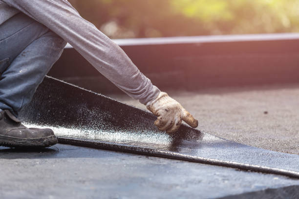 Professional Basement Waterproofing technician working in Stewart, TN